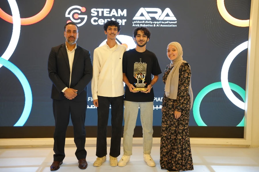 DoS_Team on stage with the AIO trophy