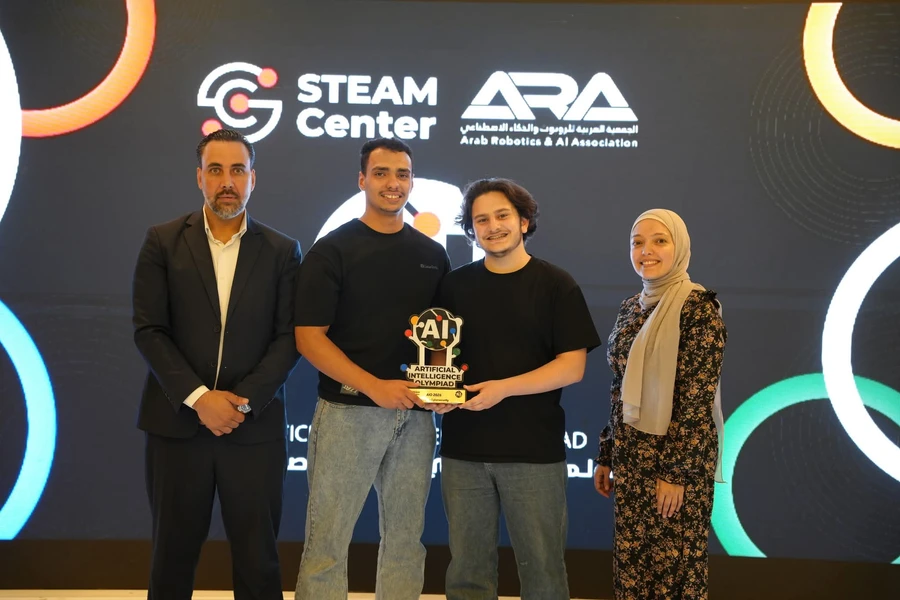 DoS_Team receiving the AIO trophy at the award ceremony